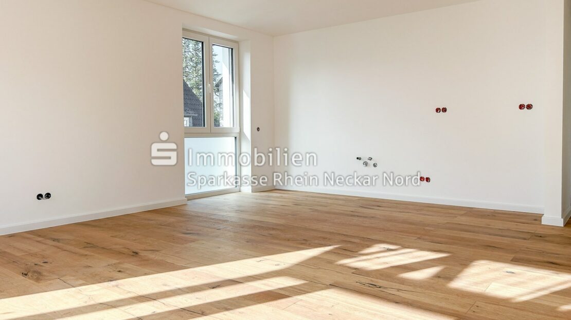 Wohnzimmer mit offener Küche
